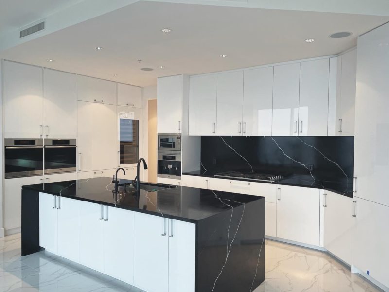 Black waterfall island kitchen